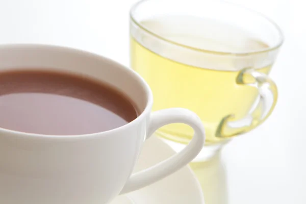 Heiße Schokolade und Tee mit transparenter Tasse — Stockfoto