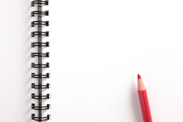 Σημειωματάριο και κόκκινο μολύβι — Φωτογραφία Αρχείου