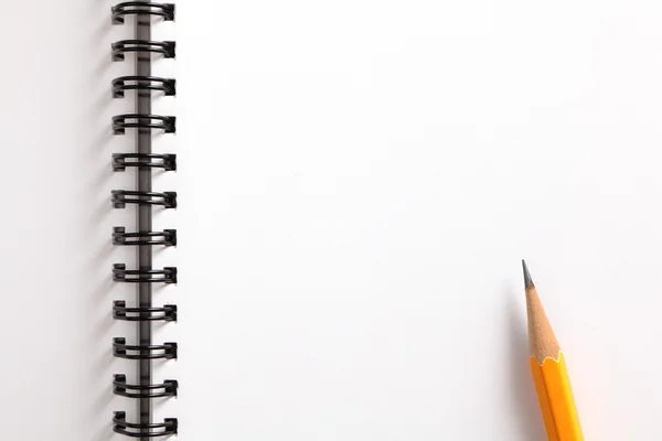 Caderno e lápis amarelo — Fotografia de Stock