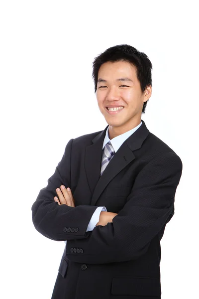 Giovane uomo d'affari con sorriso fiducioso — Foto Stock