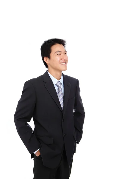 Jovem homem de negócios com sorriso confiante — Fotografia de Stock