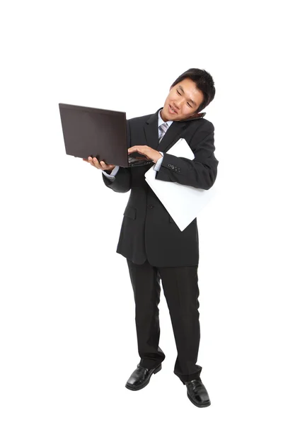 Jonge zakenman drukke voor werk — Stockfoto