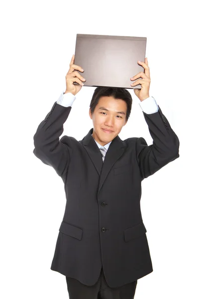 Jovem homem de negócios segurando um caderno — Fotografia de Stock