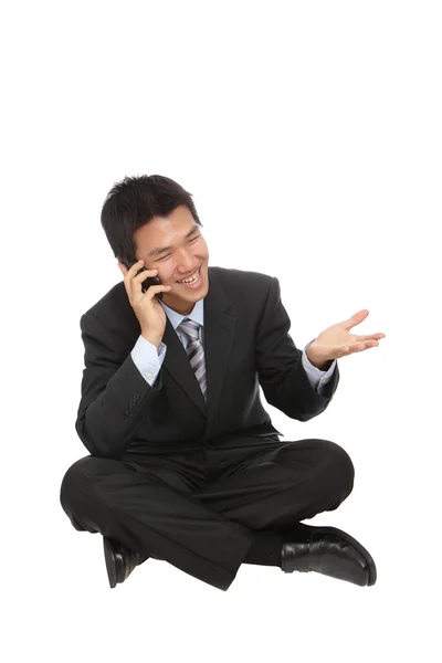 Young business man speaking with cell phone — Stock Photo, Image