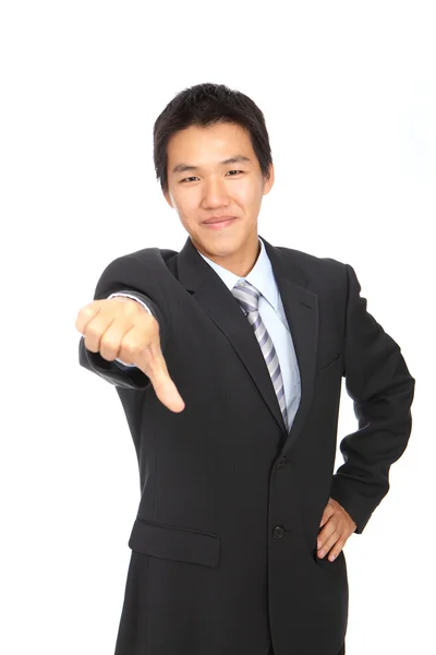 Geschäftsmann zeigt Handzeichen mit dem Daumen nach unten — Stockfoto