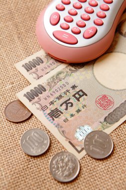 Japanese yen (ten thousand money ) with calculator clipart