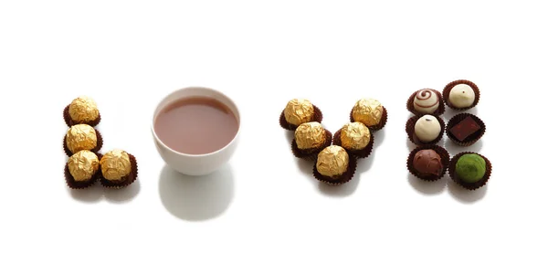 Láska kolekce čokolád a šálek kávy — Stock fotografie