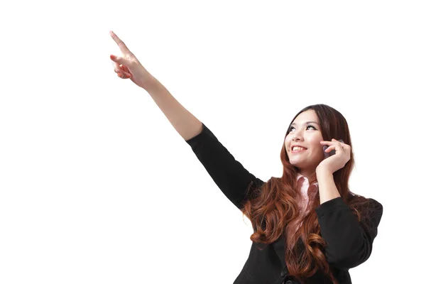 Affärskvinna tala mobiltelefon och pekar — Stockfoto