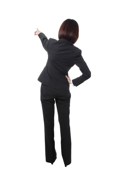 Geschäftsfrau zeigt mit erhobenem Zeigefinger zurück — Stockfoto