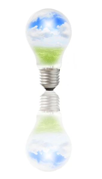 Lâmpada lâmpada com grama e céu — Fotografia de Stock