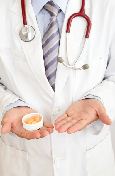 A doctor holding medicine — Stock Photo, Image