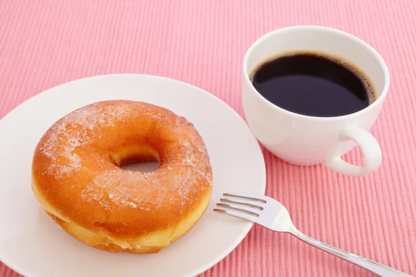 stock image Sugar donut with a cup of coffee