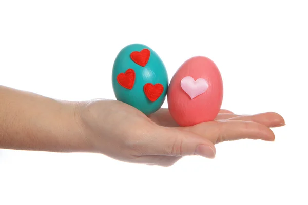 Hand and Colorful easter egg — Stock Photo, Image