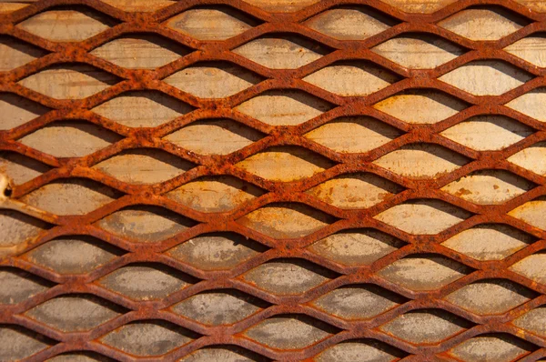 Rusty crisscross diamante fundo madeira placa Imagem De Stock