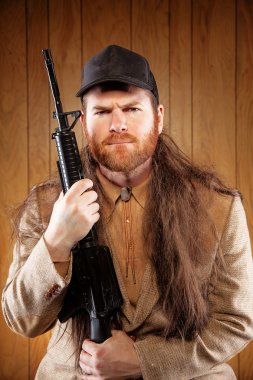 Southern Hick with a rifle and flowing hair clipart