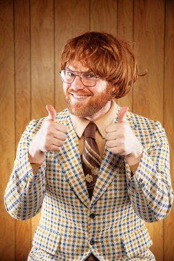 Happy Nerdy 60s Game Show Host Giving 2 Thumbs Up clipart