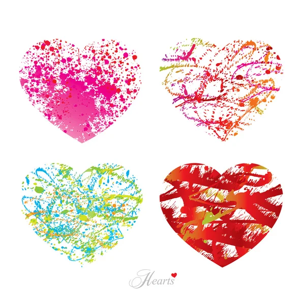Cuatro corazones diferentes con gotas, manchas y aerosoles de un cepillo . — Archivo Imágenes Vectoriales