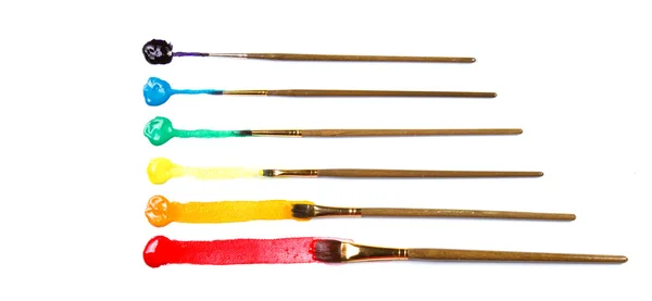 Stock image Assorted paint brushes with paint