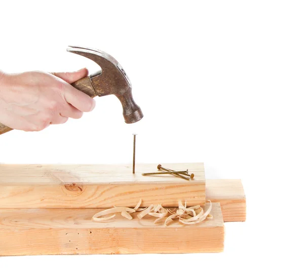 Stiking een nagel met een hamer — Stockfoto