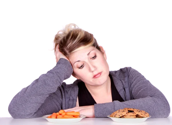 Woman on diet making eating choices — Stock Photo, Image