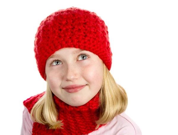 Thoughtful Girl in red winter hat — Stock Photo, Image