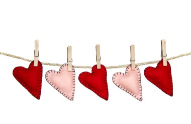 Stiched hearts on clothes line clipart