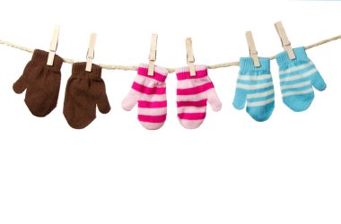 Three mittens on a clothes line clipart