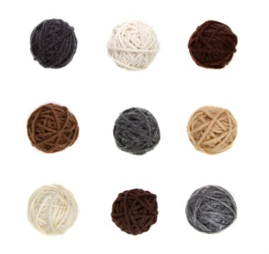 Nine differnt balls of yarn in neutral colors clipart