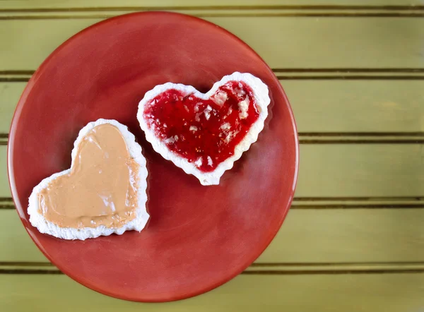 Heart shape peanut butter and jelly sandwtich — Stock Photo, Image