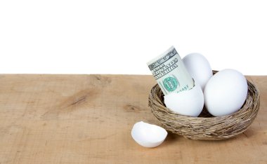 An egg with one hundred dollar bills clipart