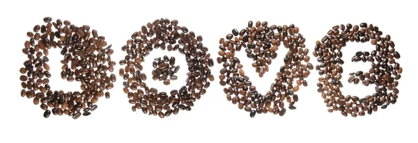 Кофе-бобы, используемые для написания слова любовь — стоковое фото