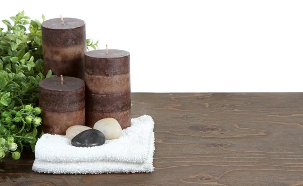 Spa Stilleven met kaarsen, stenen en handdoeken — Stockfoto