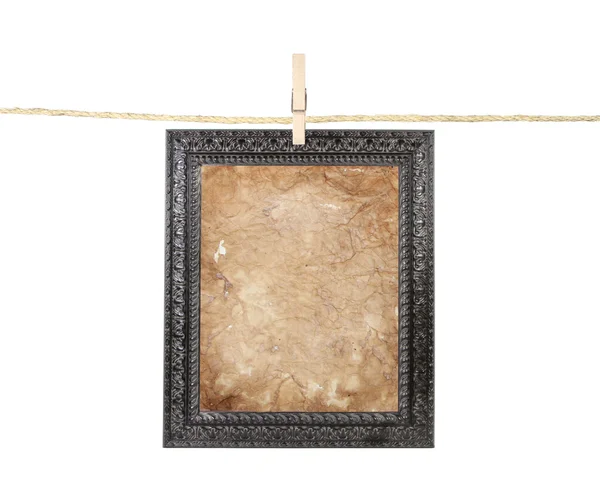 Frame with aged paper on a line — Stock Photo, Image
