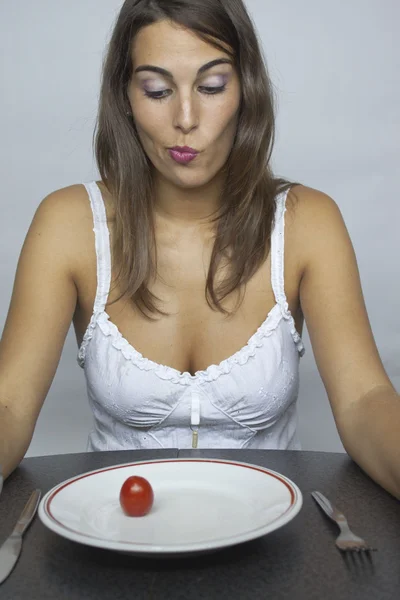 Woman looking for the plate — Stock Photo, Image