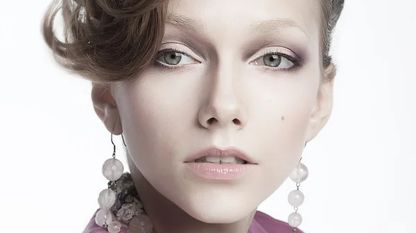 Sexy aristocratic female in earrings - beauty portrait — Stock Photo, Image