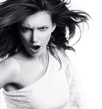 Yelling young female with waving long hair - series of photos clipart