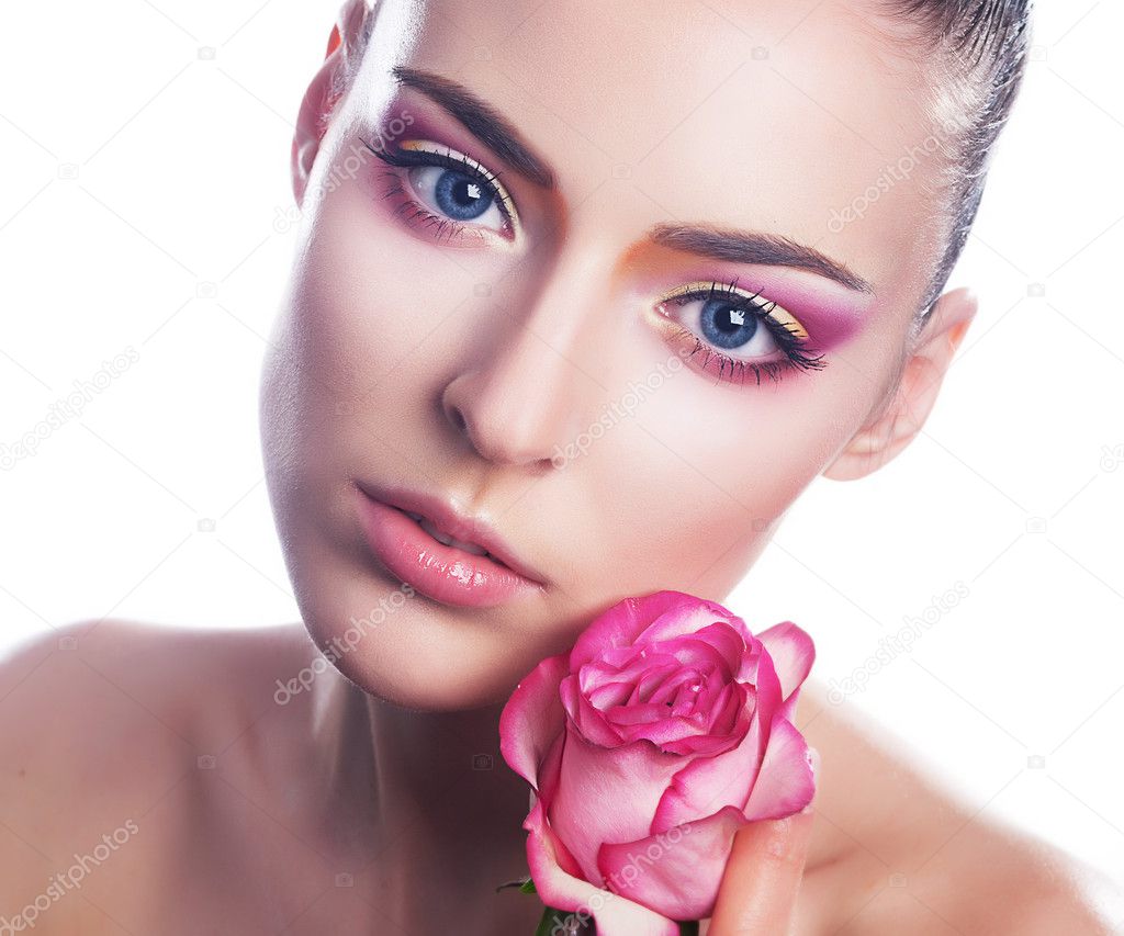 Sensual beauty girl face with flower - pink rose
