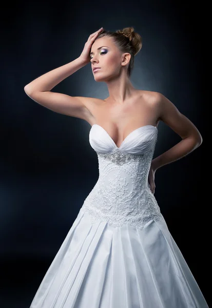 Alluring sexy bride blonde fashion model posing in studio — Zdjęcie stockowe