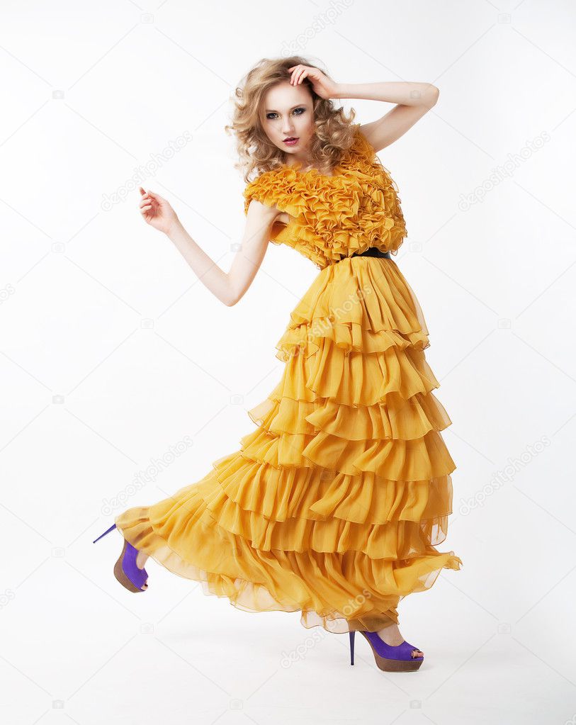 Lovely happy active female blond hair woman in modern dress