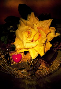 Retro still life - yellow rose and symbol of heart clipart