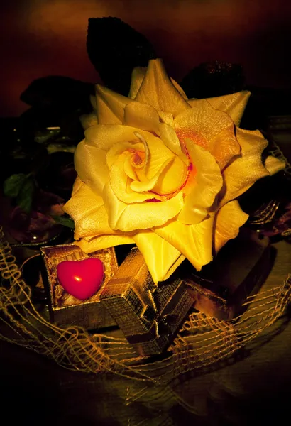 stock image Retro still life - yellow rose and symbol of heart