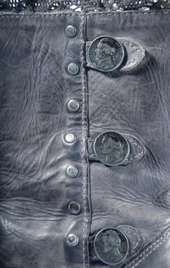 Gray leather texture background with buttons close up clipart