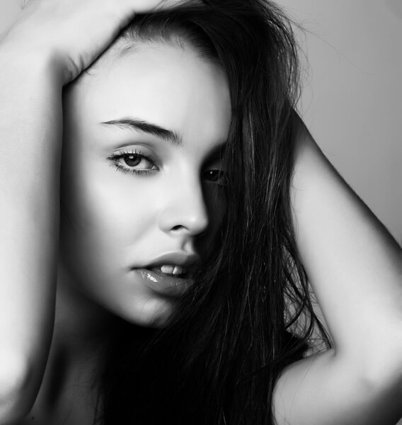 Black and white portrait of beauty sexy girl with the clean healthy skin