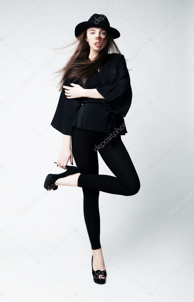 Vintage - stylish caucasian girl in black clothes isolated