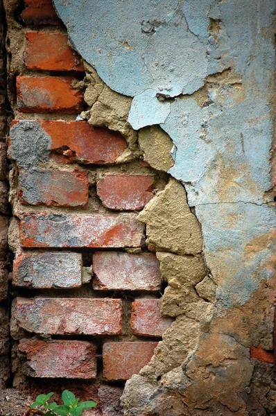 Stucco sbucciato su muro di mattoni — Foto Stock