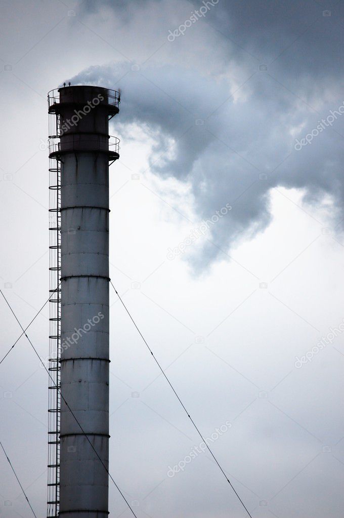 Smoke coming from industrial plant chimney
