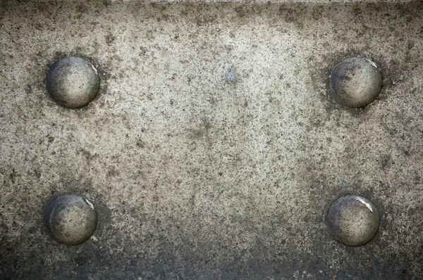 Bolts on grunge textured — Stock Photo, Image