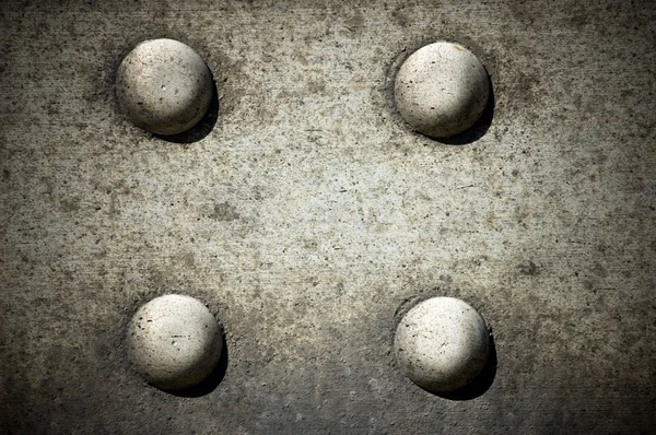 Bolts on grunge textured — Stock Photo, Image