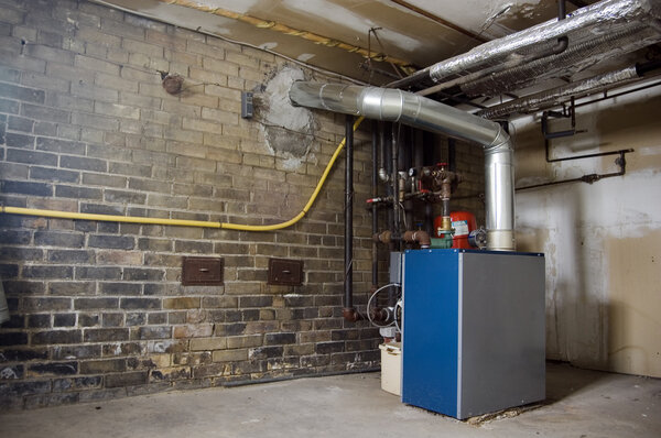 Boiler in basement ; industrial dirty grunge background