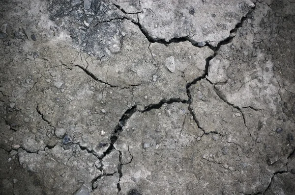Тріщина на кам'яній стіні; абстрактний брудний гранжевий фон — стокове фото